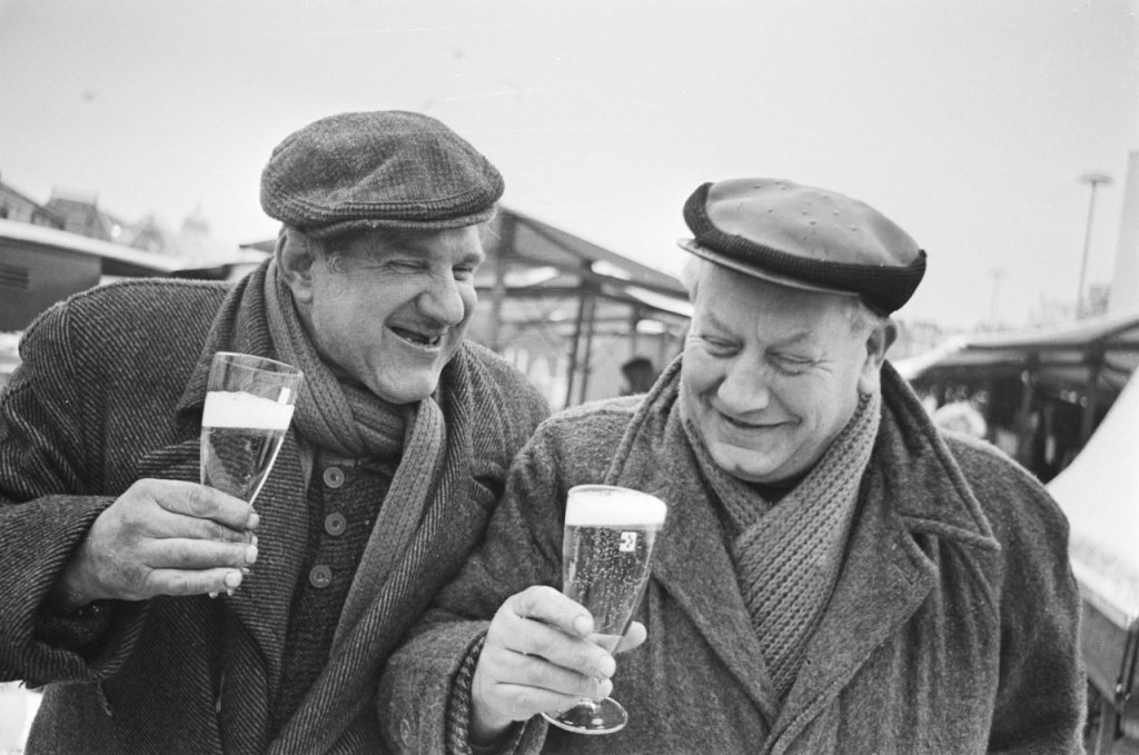 Two friends enjoying beer