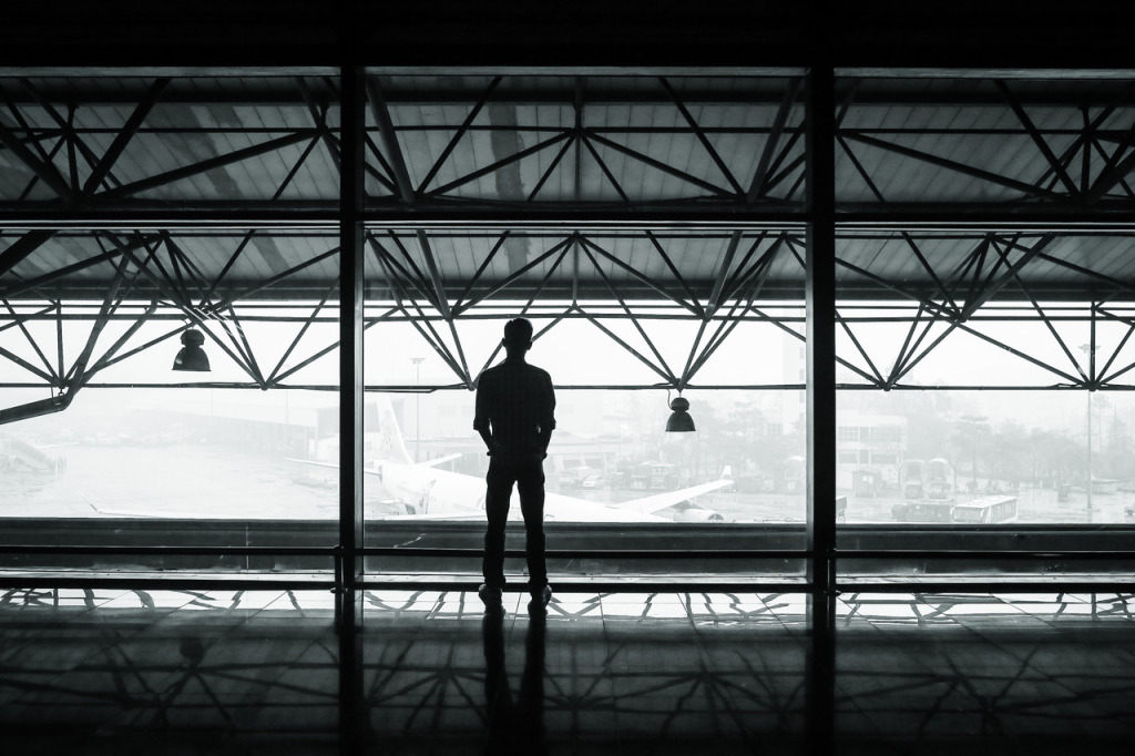 Man Watching Planes at Airport